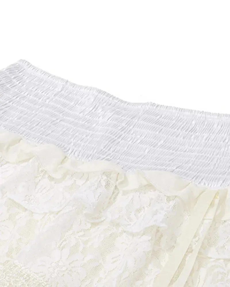 Orietta – Adjustable side drawstrings – Ruffled mini skirt