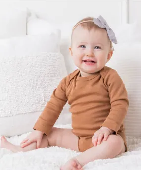 Rust Organic Long-Sleeved Body Suit